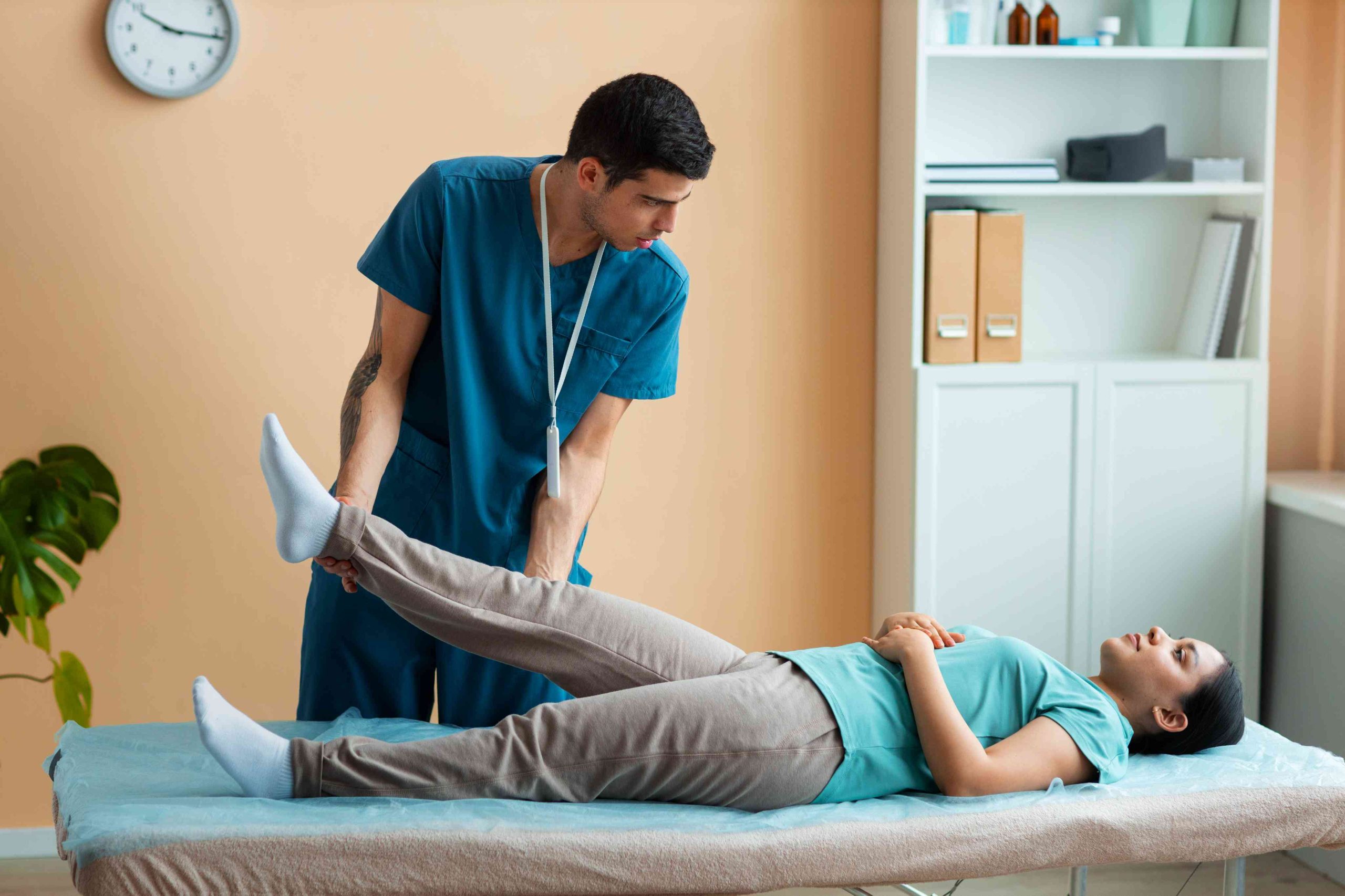 Physiotherapist assisting patient in recovery session at Enspire Physio clinic Calgary