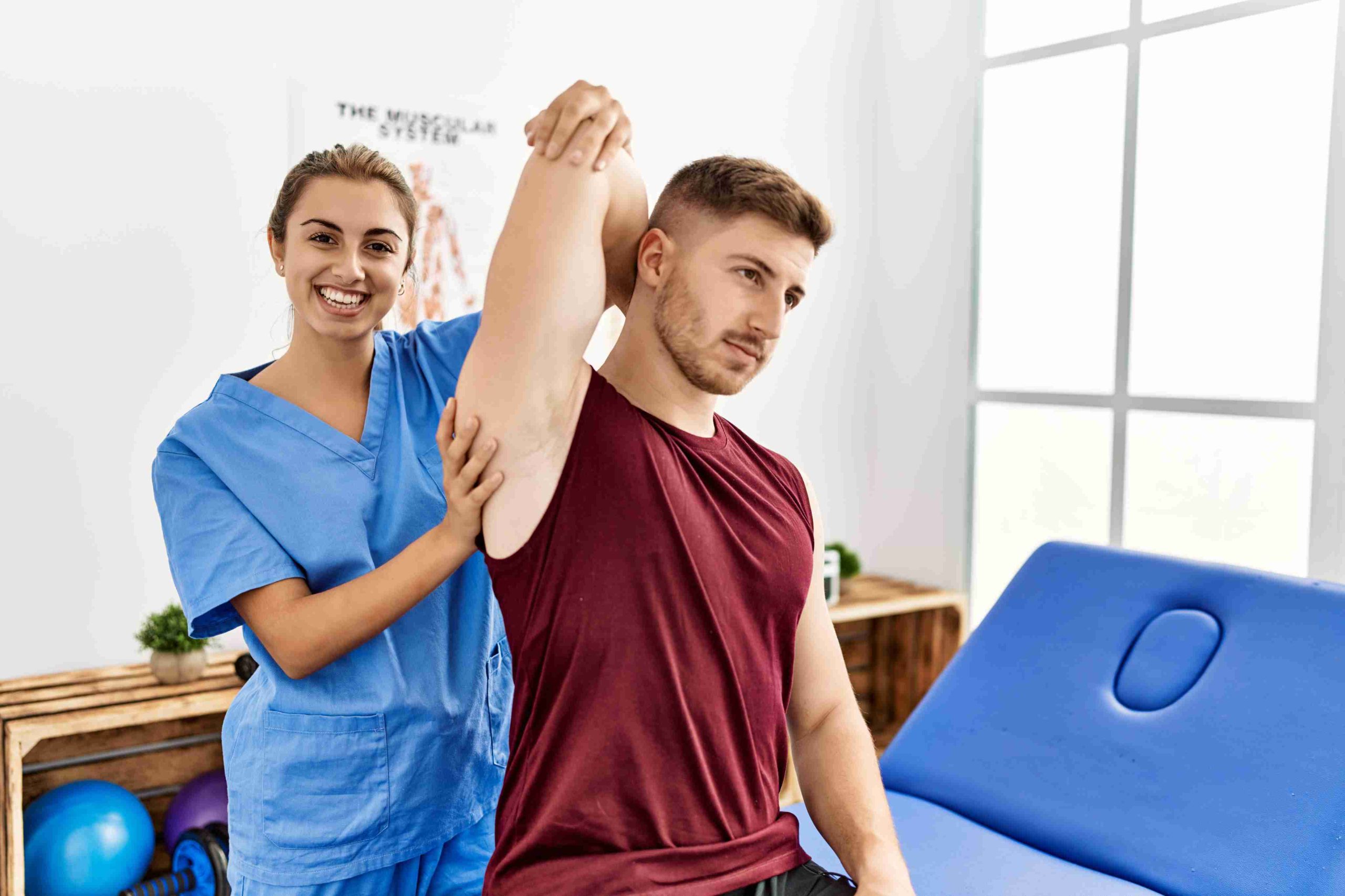 Physiotherapist assisting patient with mobility exercises at Enspire Physio Calgary